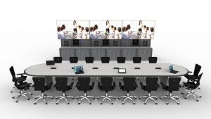 collaboration-style noc desk with basic worksurface, task chairs, and wall mounted displays, with large table