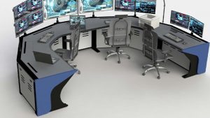 multi-operator control room console with task chairs, monitor screens, and blue side panels